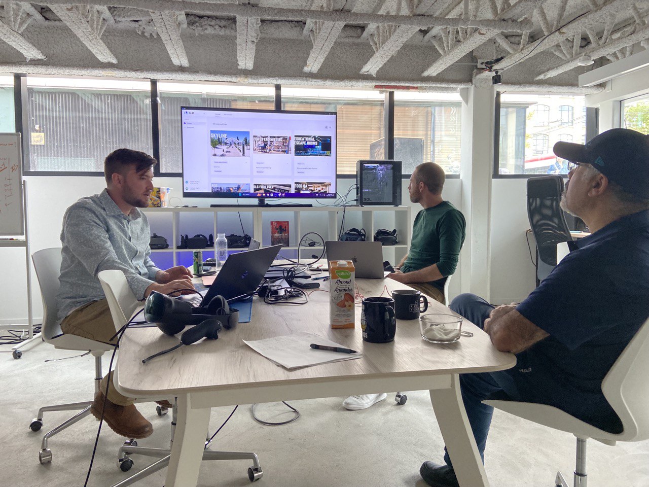 UP360 team collaborating in office